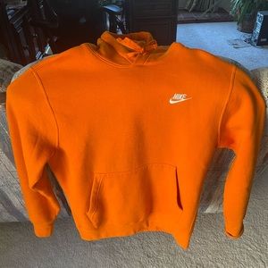 Orange Nike sweatshirt